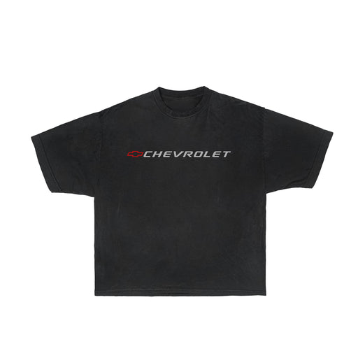 A black t-shirt featuring the Chevrolet logo in bold lettering, perfect for car enthusiasts.