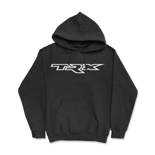 Image: A person wearing a black hoodie adorned with the Dodge TRX logo on the front. The hoodie exudes a sleek and powerful aesthetic, perfect for fans of high-performance trucks.