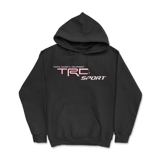 Image: A person wearing a black hoodie with the Toyota logo on the front. The hoodie is styled with a modern design and offers comfort for everyday wear.